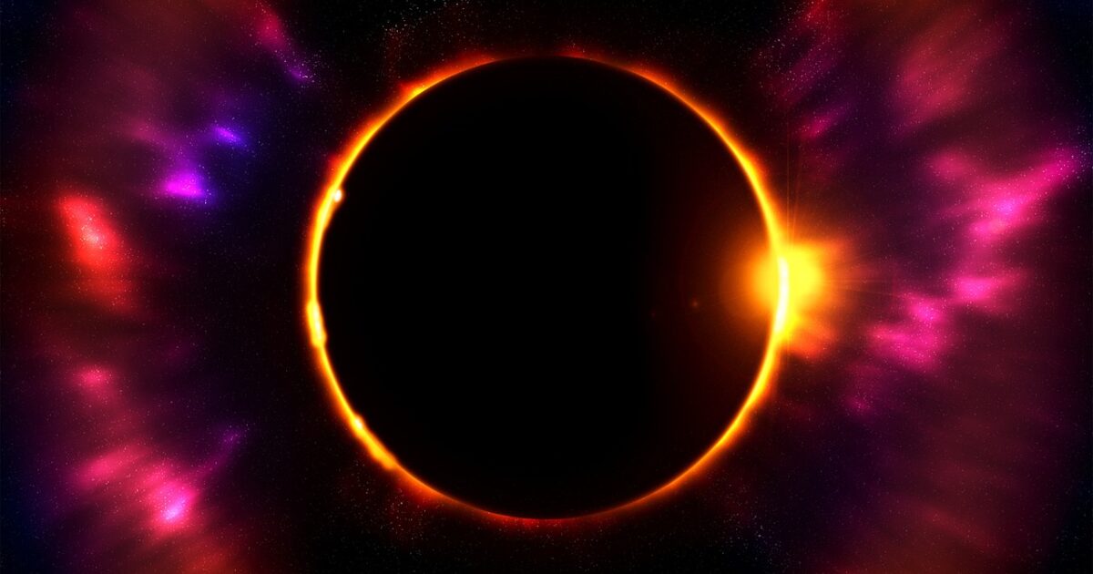 太陽の光に照らされた皆既日食の瞬間