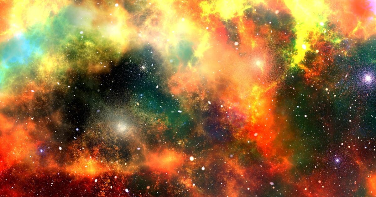 色鮮やかな星雲と無数の星が輝く宇宙空間